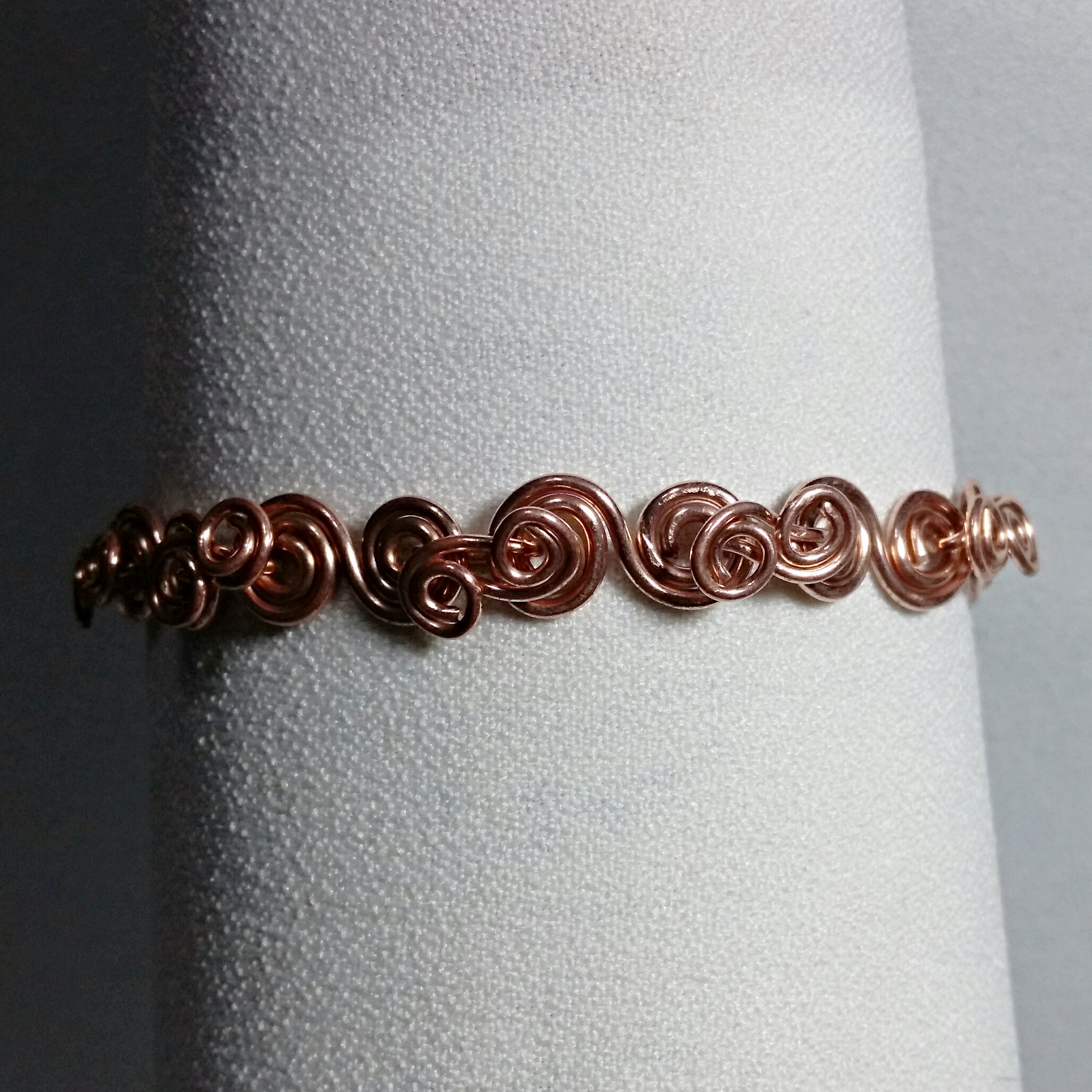 Steel double bracelet in copper colour – pearlescent flowers, a